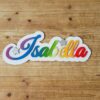 Rainbow coloured name Isabella with silver stars